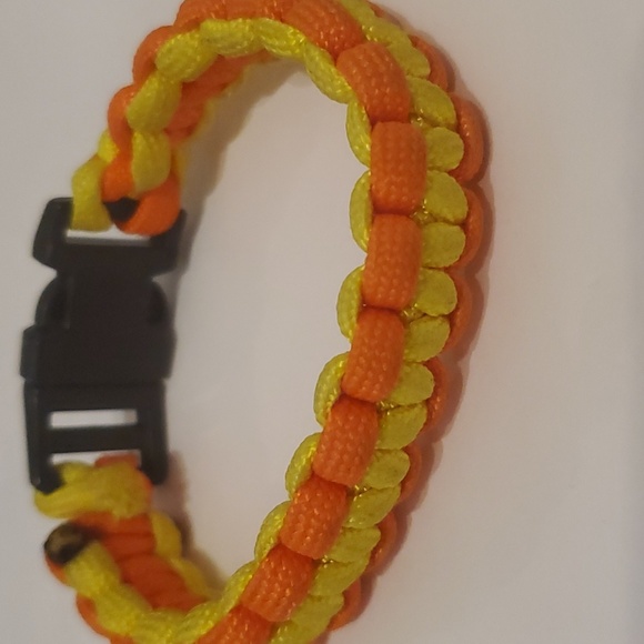 Orange & Yellow Paracord Bracelet. It is also known as a Survival Bracelet - Picture 2 of 2